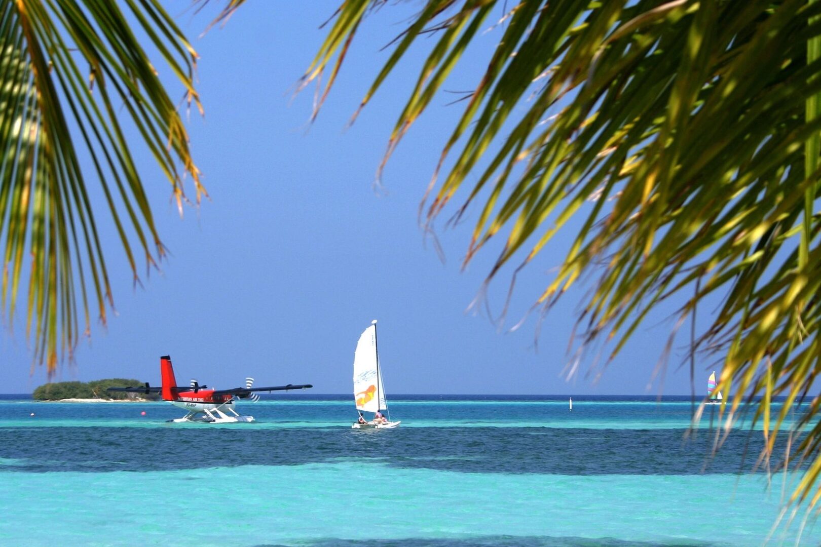 Beautiful morning blue sea with sail boat